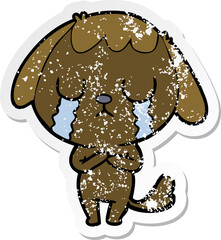 distressed sticker of a cute cartoon dog crying
