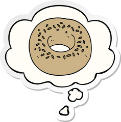 cartoon donut and thought bubble as a printed sticker
