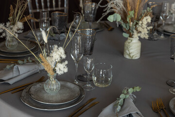 table setting. Glassware and cutlery for catered event dinner.