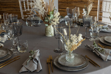 table setting. Glassware and cutlery for catered event dinner.