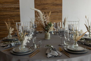 table setting. Glassware and cutlery for catered event dinner.