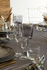 table setting. Glassware and cutlery for catered event dinner.