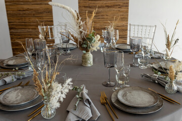 table setting. Glassware and cutlery for catered event dinner.