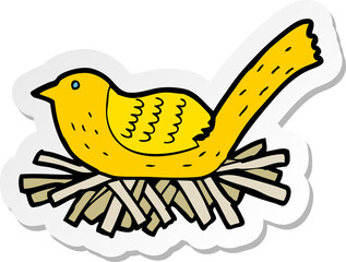 sticker of a cartoon bird on nest
