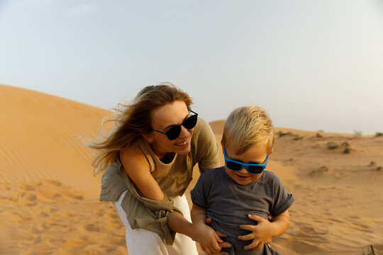 Mother and her son playing together 