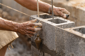 unrecognizable man taking measurements