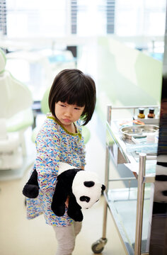 Asian little girl in dental clinic
