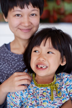 Asian little girl with her mother, tooth extraction in hospital