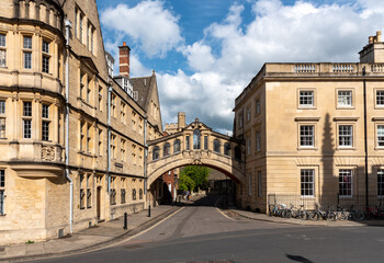 Fototapeta na wymiar Hertford Bridge, often called the Bridge of Sighs, is a skyway joining two parts of Hertford College over New College Lane in Oxford, England.