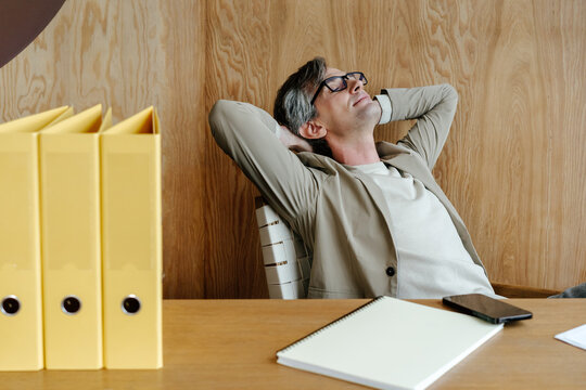 Businessman relaxing in workplace