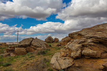 Fototapeta premium rock, landscape, sky, nature, mountain, sea, stone, water, beach, cloud, rocks, travel, clouds, sand, summer, coast, ocean, rocky, hill, bay, desert, outdoors, sun