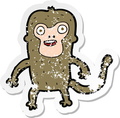 retro distressed sticker of a cartoon monkey