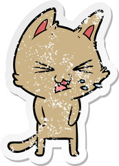 distressed sticker of a cartoon cat hissing