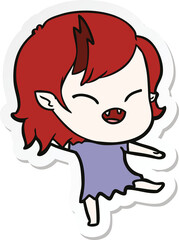 sticker of a cartoon laughing vampire girl