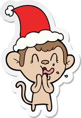 crazy sticker cartoon of a monkey wearing santa hat