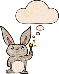 cute cartoon rabbit and thought bubble in grunge texture pattern style