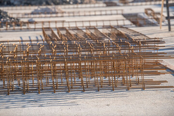 Stirrups to make beam structure  preparing for reinforced concrete column.Construction site.