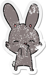 distressed sticker of a curious bunny cartoon