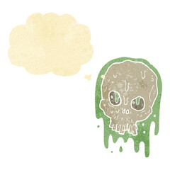 cartoon slimy skull with thought bubble