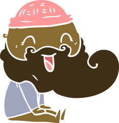 happy bearded man sat down laughing