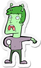 sticker of a cartoon unhappy alien