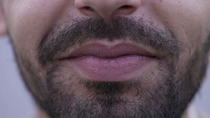 Fototapeta premium One happy Middle Eastern man mouth closeup smile. Bearded male person macro detail smiling