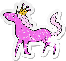 retro distressed sticker of a cartoon unicorn