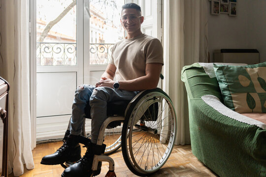 Portrait Of A Happy Young Man With A Disability