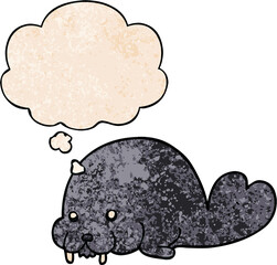 cute cartoon walrus and thought bubble in grunge texture pattern style