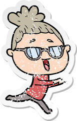 Obraz premium distressed sticker of a cartoon happy woman wearing spectacles