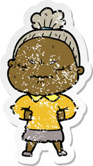 distressed sticker of a cartoon annoyed old lady