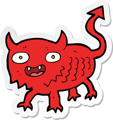 sticker of a cartoon little demon