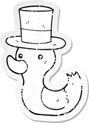 distressed sticker of a cartoon duck wearing top hat