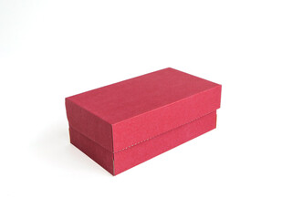 Red long craft box on white background. Place for text and logo. The concept of packaging, gift, holiday. High quality photo