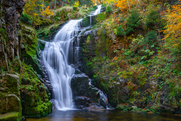 Fototapeta na wymiar Kamienczyk Waterfall: Majestic Cascading Beauty in Poland Mountains