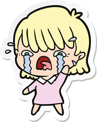 sticker of a cartoon girl crying