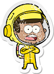 distressed sticker of a cartoon surprised astronaut