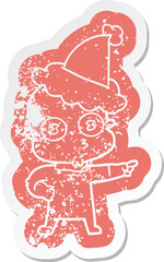 cartoon distressed sticker of a weird bald spaceman wearing santa hat