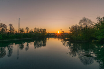 A river with a sunset in the background, Casier, Sile, Treviso, Italy
