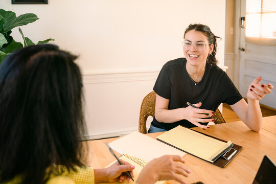 young woman talking during an interview 
