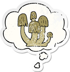 cartoon mushrooms and thought bubble as a distressed worn sticker