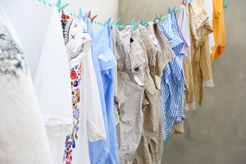 clothes hung to dry in the sun on an outside clothesline