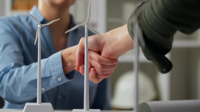Handshake, Woman business man Shaking hands tensely In an independent energy creation company, In slow motion Professional worker Confirming future business deal, teamwork
