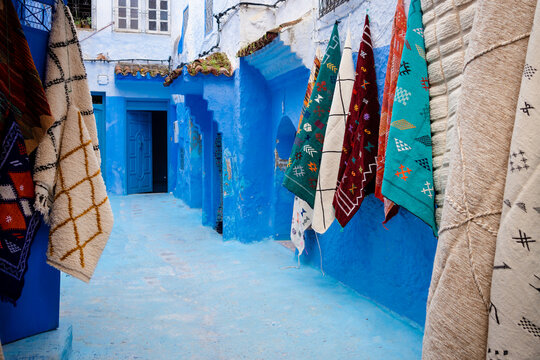 Handmade carpets on sale in a bazaar in Chefchaouen, Morocco