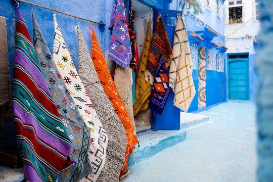 Handmade carpets on sale in a bazaar in Chefchaouen, Morocco
