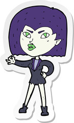 sticker of a cartoon vampire girl