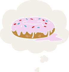 cartoon donut and thought bubble in retro style