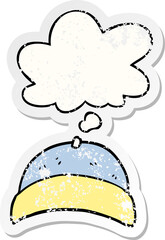cartoon hat and thought bubble as a distressed worn sticker