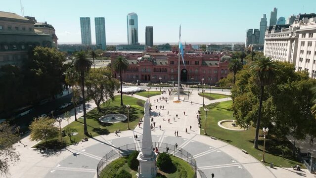 Drone Travelling In to Casa Rosada in Buenos Aires: Sunny Day with Pyramid of May and River View