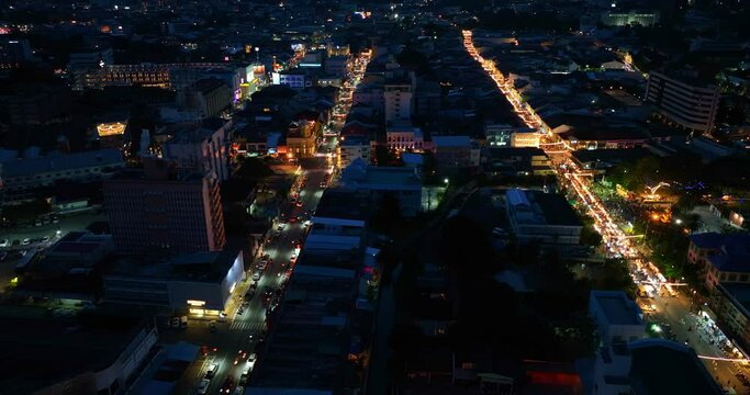Phuket,Thailand-April,02,2023:.aerial view The lights twinkled along Talang walking street at twilight..beautiful sky in twilight. popular landmark in Phuket..